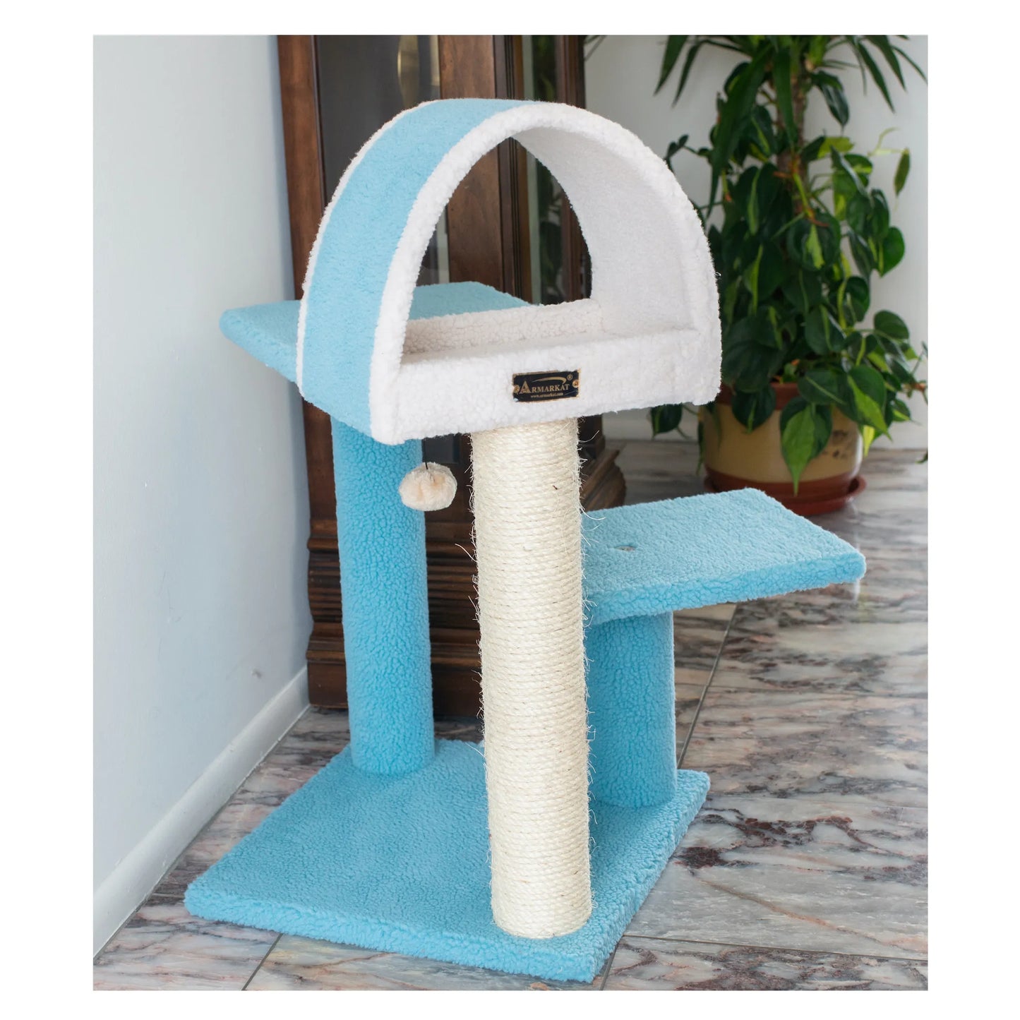 Blue and white cat tree with a scratching post on a marble floor.