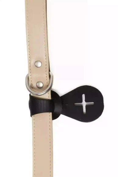 A silicone waste bag holder attached to a dog leash.