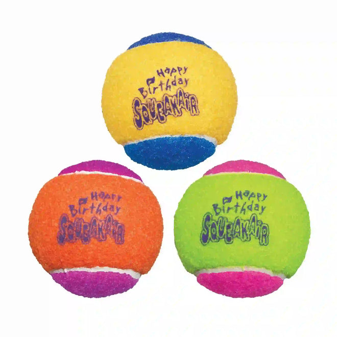 KONG SqueakAir tennis balls designed for dog fetch play, with the brand name 'KONG' and the product line 'SqueakAir' displayed prominently.