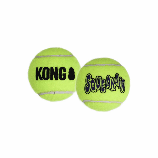 Two green KONG SqueakAir tennis balls designed for dog fetch play, with the brand name 'KONG' and the product line 'SqueakAir' displayed prominently.