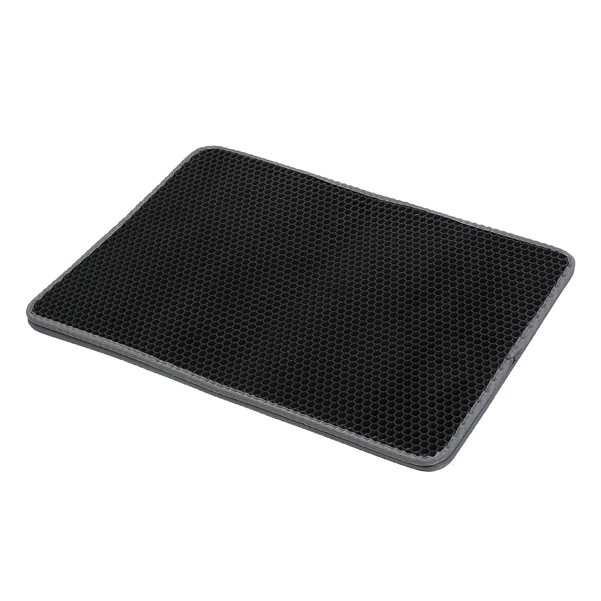 Black honeycomb mat on a white background