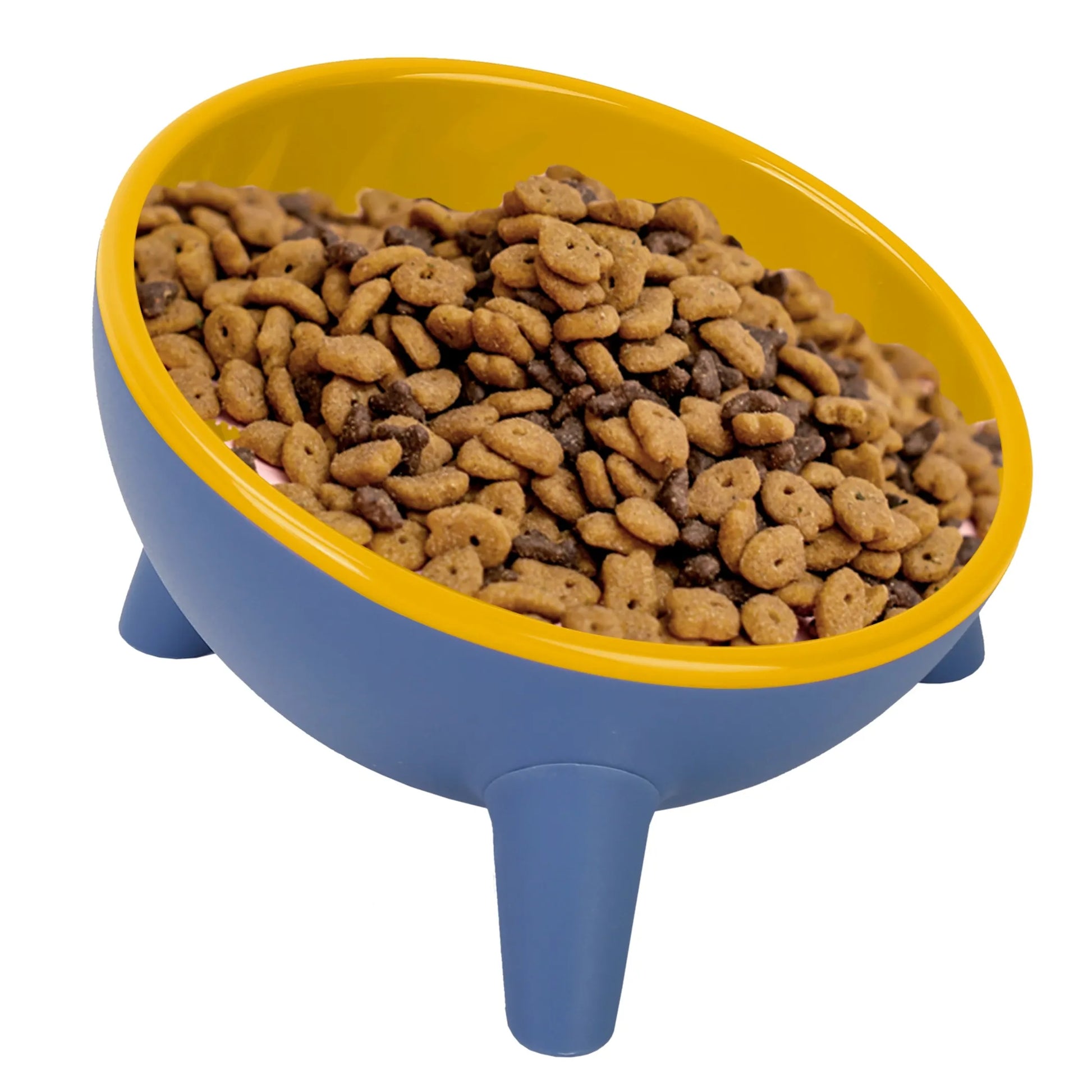 Blue and yellow pet food bowl filled with kibble on a white background